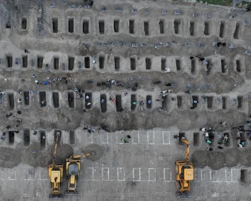 Debate Erupts Over Authenticity of Iran's Graveyard Photo - A Photo Of Iran’s Bombed Schoolgirl Graveyard Went Around The World. Was It Real, Or AI?